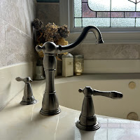 Elegant oil-rubbed bronze bathtub faucet installation